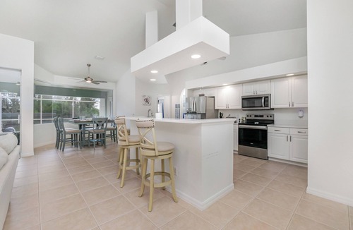 Burnt Store House | Exclusive Deal: Luxury Water Jewel featuring Private Boat & Spa