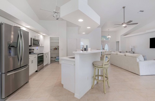 Burnt Store House | Exclusive Deal: Luxury Water Jewel featuring Private Boat & Spa