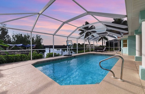 Burnt Store House | Exclusive Deal: Luxury Water Jewel featuring Private Boat & Spa