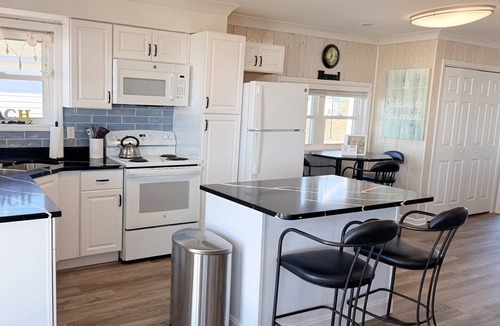 Holden Beach House | Experience beachfront bliss at Sea It All in Holden Beach, NC, perfect for 6 guests.