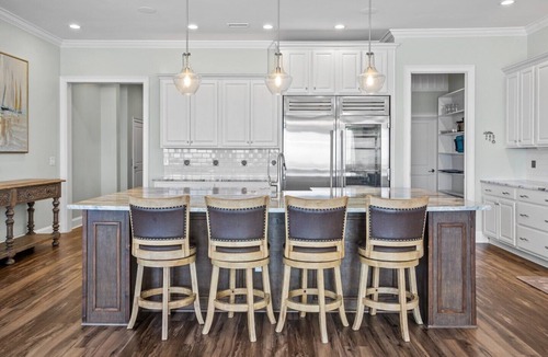 North Topsail Beach House | Experience oceanfront luxury at Topsail Manor, a spacious 8-bedroom paradise in North Topsail Beach.