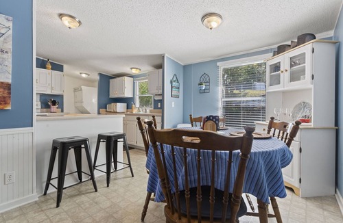 Greenwood House | Family - Friendly Lakefront Home with a Covered Boat-slip.