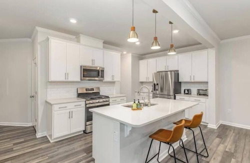 Garner House | Family Friendly with Sunroom & Game Room