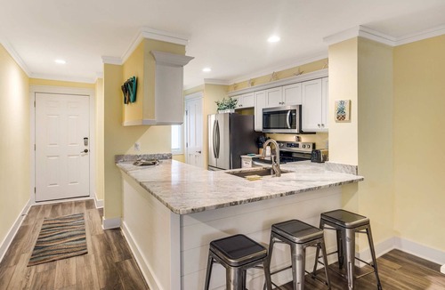Folly Beach House | First-floor villa w/magnificent river view & community pool/dock/tennis courts