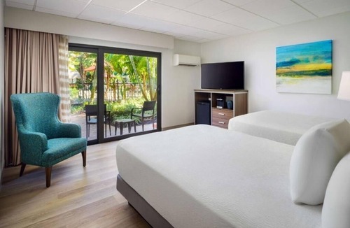 Moorings Hotel | Garden Hideaway: Serene Room Just Steps from Paradise