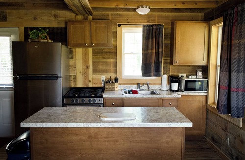 Ashburn Cabin | Georgia Golf Cottage with 9-hole course, pool, tennis court, clubhouse and more!