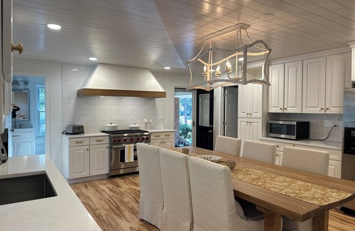 Raintree House | Golf course home in Raintree Country Club. Outdoor oasis with pool and hot tub.