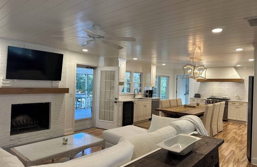 Raintree House | Golf course home in Raintree Country Club. Outdoor oasis with pool and hot tub.