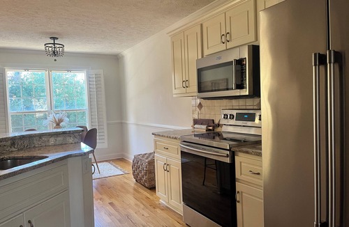 Plantation South House | Gorgeous 4-bedroom house with a beautiful pool and a garden oasis.