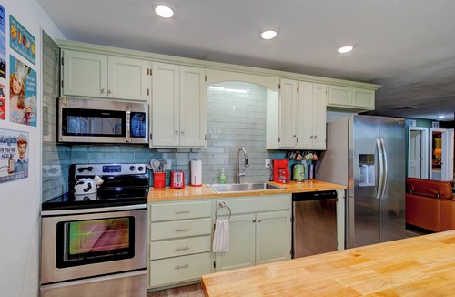 Sanford House | Happy Palette Home: Close to downtown+the lake! Fenced yard with outdoor dining