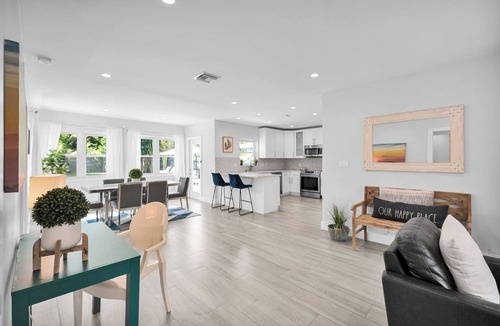Poinsettia Heights Villa | Heated pool, 2 miles from Beach! Updated home: BBQ, large backyard, comfy beds