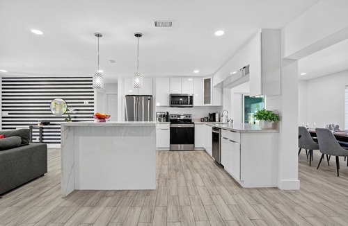 Coral Ridge Isles House | Heated Pool 4 BR Retreat - 30 min to WC Stadium