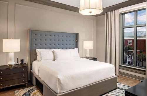 Ansonborough Hotel | Historic Charleston Retreat: Full Kitchen + Balcony l Steps to Aquarium -0.3 mi