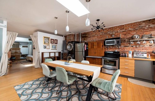 Yamacraw Village Apartment | Historic Downtown Bohemian Loft with Exposed Brick by Lucky Savannah