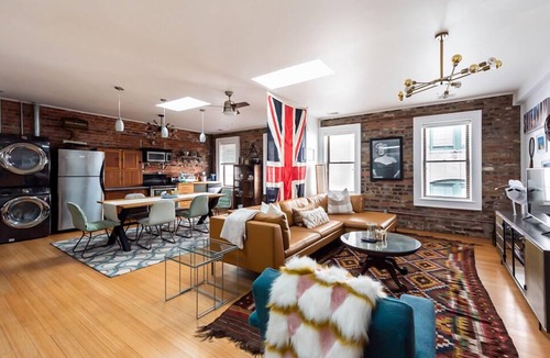 Yamacraw Village Apartment | Historic Downtown Bohemian Loft with Exposed Brick by Lucky Savannah