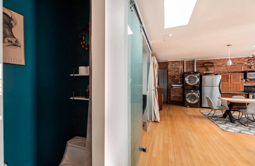 Yamacraw Village Apartment | Historic Downtown Bohemian Loft with Exposed Brick by Lucky Savannah