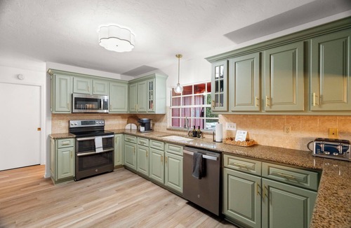 Palma Sola House | Hot Tub, Heated Pool Resort Home w/Mini Golf! Sleeps 20!