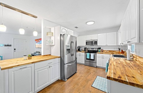 New Smyrna Beach House | Iconic Sea Turtle Home Entire House, sleeps 6-7, minutes from the beach.