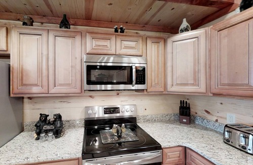 Sevierville Cabin | Indoor Pool, Theater, VIEWS, Hot Tub, Themed Bedrooms, Game Room & Free Tickets! 6 BR Large Cabin