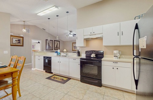 Crescent Lakes House | Inviting pool home with tranquil pond view near theme parks & attractions