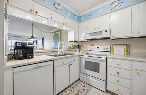 Atlantic Beach Condo | It's Beach Time at A Place at the Beach waterpark resort. This 2-bedroom, 2-bathroom condo offers fun accommodations overlooking the waterslide & pools. On-site you'll find mini-golf, tennis, beach access and SO MUCH MORE!