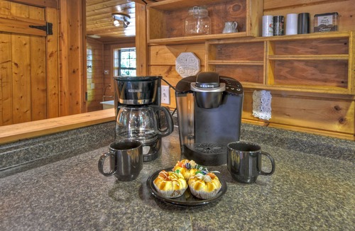 Ellijay Cabin | Keeping it Reel -Your pet-friendly creekfront haven, complete with hot tub, firepit, pool table, WiFi, and superb fishing