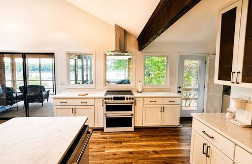 Bracey House | Lake Gaston Waterfront Home: Dock, Hot Tub, Kayaks, Firepit, Dogs Welcome