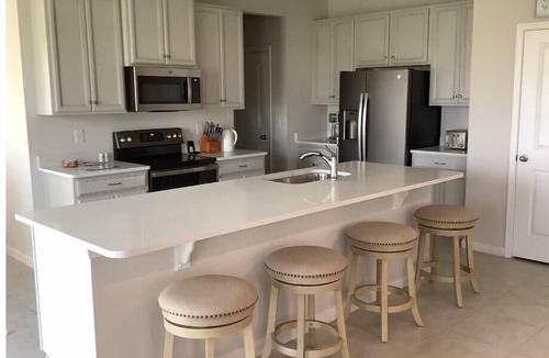 Westside House | Lake View, Spacious 4 Bedroom Home on Quiet Street