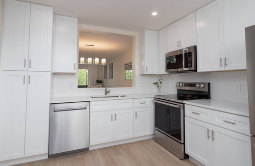 South Bradenton Condo | LAKE VIEWS! GORGEOUSLY UPDATED! 1700 total sqft with OVERSIZED LANAI!