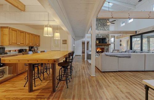Tiger House | Lakefront 4BR, 4.5BA retreat with boathouse, fire pit, and serene Lake Burton views.