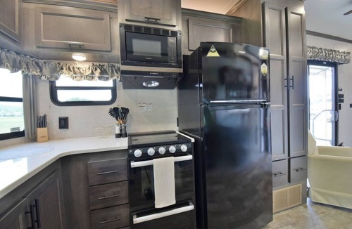 Decatur Apartment | Lakeside Fire Pit Grill Games Picnic Space