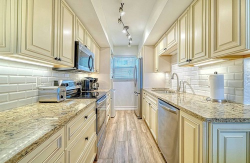Longboat Key Condo | LaPlaya 102B-Directly on the beach with the warm Gulf waters waiting!