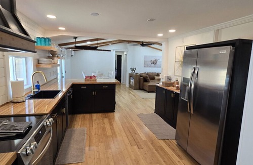 Peletier House | Large Summer Getaway near the beach with private pool, Hottub, and firepit, three miles to Beach.
