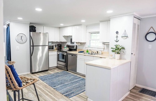 Fair Play House | Light & Airy Lakefront Home with Flat Yard, Private Dock, Deck & Screened Porch