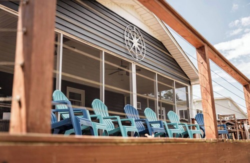 Fair Play House | Light & Airy Lakefront Home with Flat Yard, Private Dock, Deck & Screened Porch