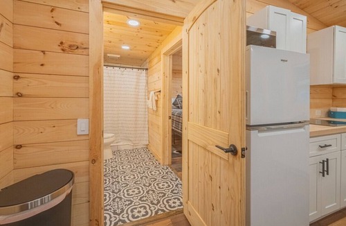 Gumlog House | "Lilliputian Hideaway: A Lakeside Dream"