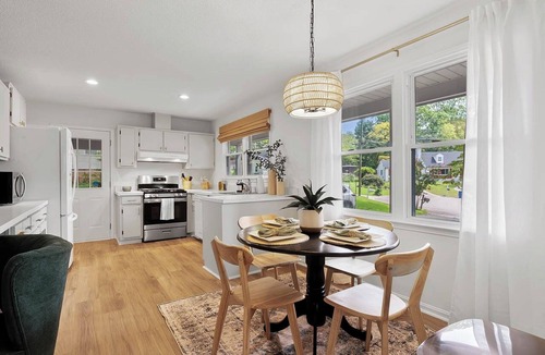 Eastgate House | Luxurious 4BD near Downtown and RDU, with sunroom, theatre, games, & more!