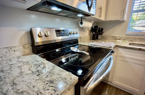 East County Civic Group House | Luxury 4BR Getaway with Heated Pool & Cozy Vibes!