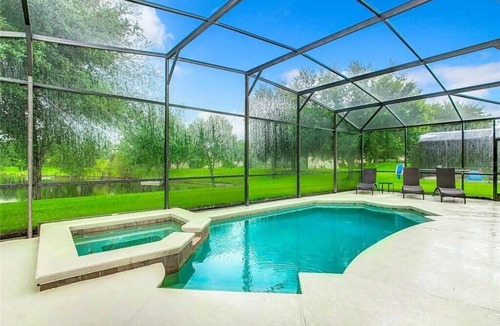Calabria House | Luxury 5BR Waterfront Retreat w/Pool, Hot Tub & Game Room Near Disney