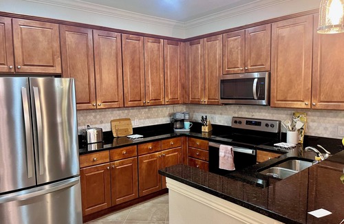 Ole Condo | Luxury Coastal Modern retreat in LELY near the beach with resort-style amenities