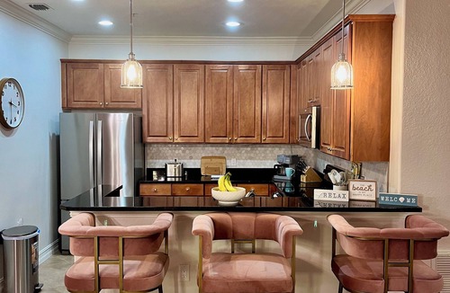 Ole Condo | Luxury Coastal Modern retreat in LELY near the beach with resort-style amenities