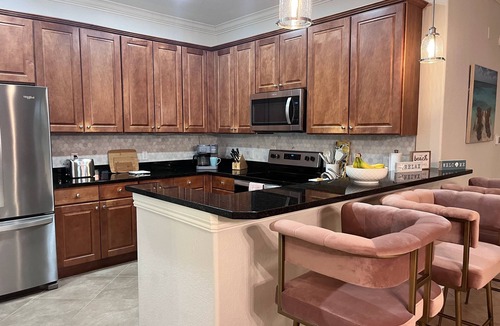 Ole Condo | Luxury Coastal Modern retreat in LELY near the beach with resort-style amenities