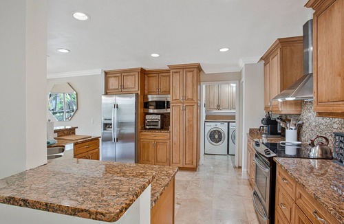 Crown Pointe House | Luxury Lakefront Home with Pool, 2 King Suites, 4 BR 5 BA Near 5th Ave & Beaches