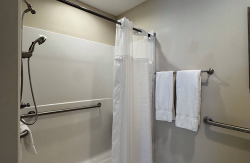 Elizabethtown Resort | Luxury Lodging, Lakefront View, King Bed w/Private Bath, Handicap Shower, Private Patio.