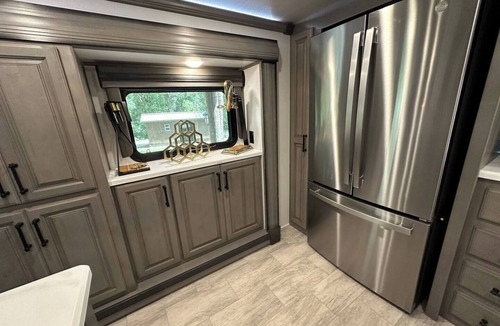 Lake Helen House | Luxury RV glamping with fire pit; charming & cozy; secluded yet close to town