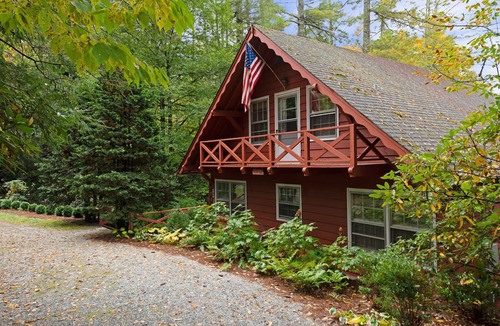 Mirror Lake Ski Chalet | Maison Rouge, Mid-Century-Modern Swiss Chalet on Beautiful Mirror Lake