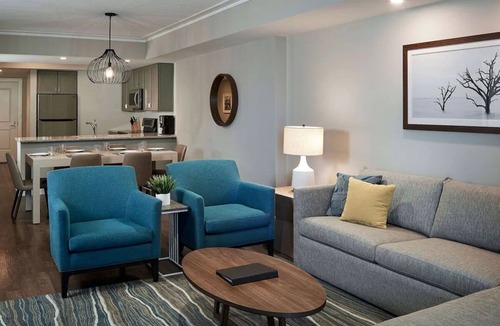 Downtown Myrtle Beach Hotel | Modern 2-Room Ocean View Suite with Balcony and Spacious Living Area