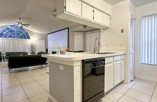 Royal Palm Bay Condo | Modern condo with outdoor pool, full kitchen