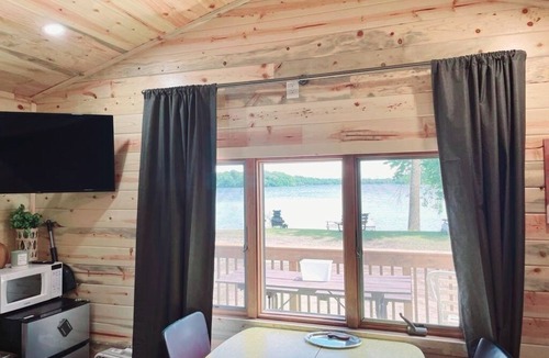 Alexandria Cabin | Modern lakeside cabin with panoramic views and deck.