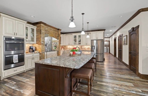 Cleveland House | Mountainside Manor l Custom pool & movie theater!